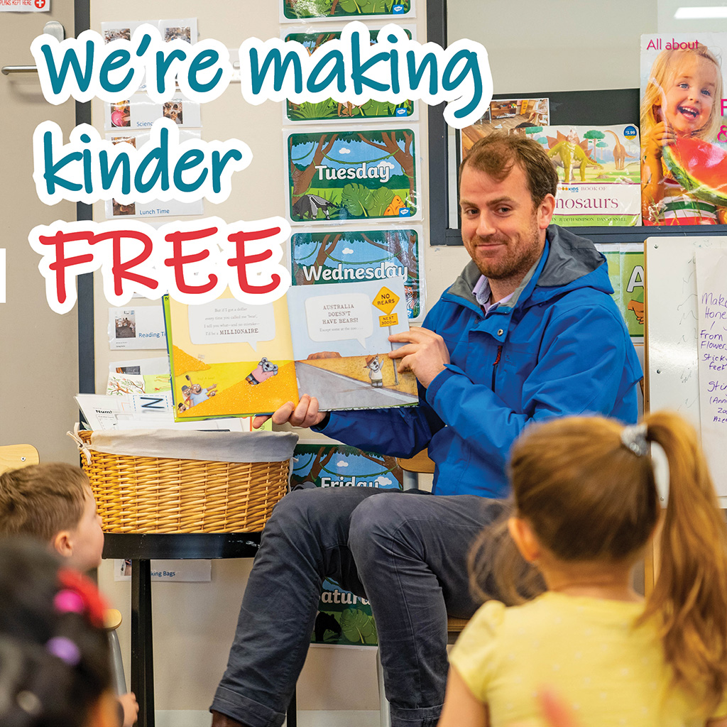 Jackson Taylor reading a book to kids at a local kindergarten. Caption: We're making kinder free!